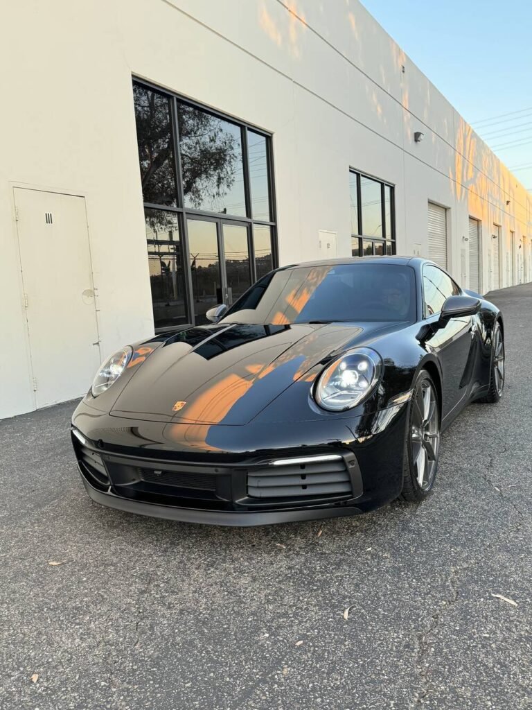 Porsche 911 receiving paint protection film at Socal Vinyl and Paint Protection Shop, Orange County